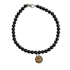 Tiffany & Co. Yellow gold round RTT tag onyx mini bead bracelet